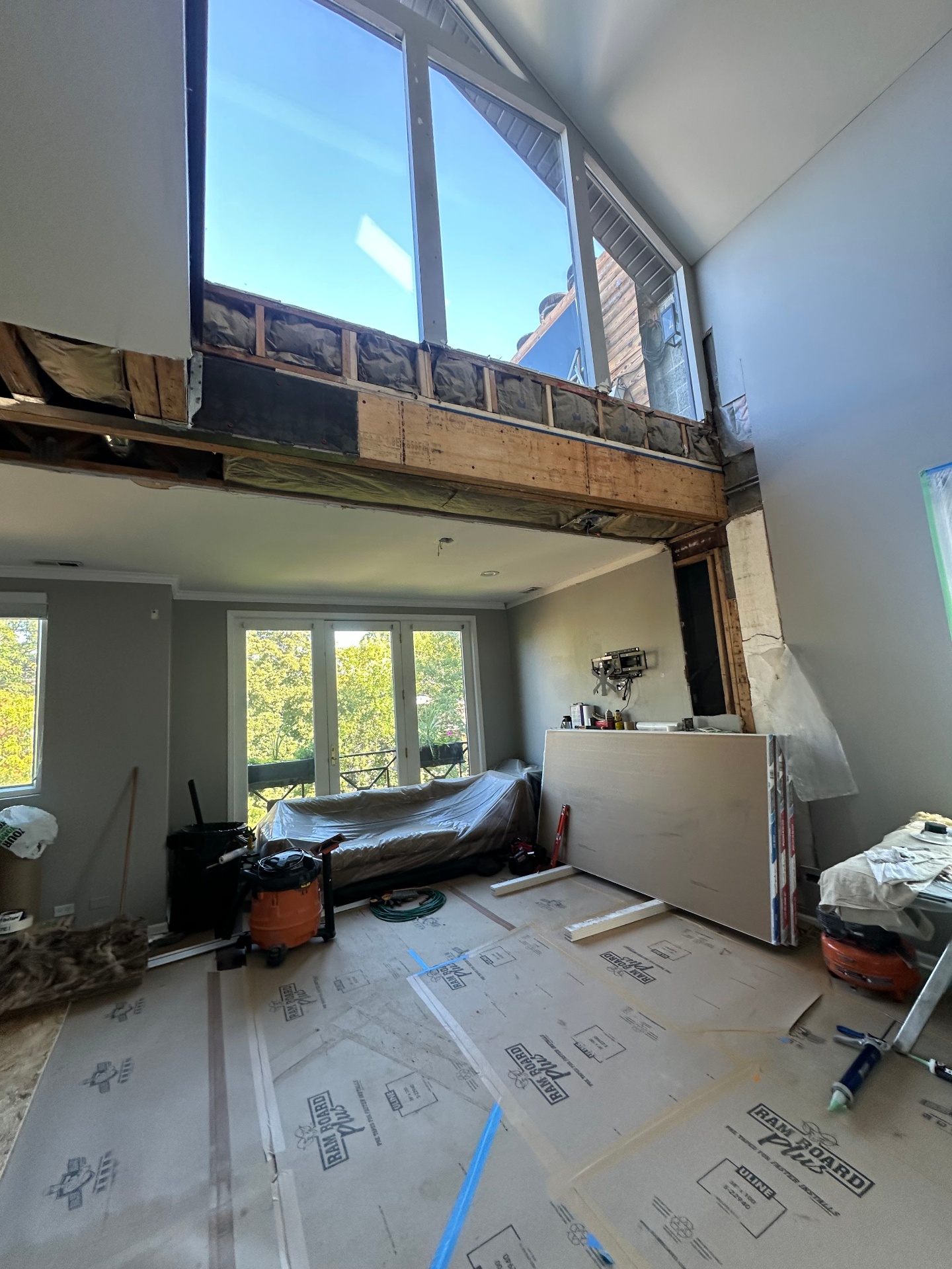 Vaulted great room ceiling rebuild - Hang - new drywall going up (Highland Park, IL drywall project)