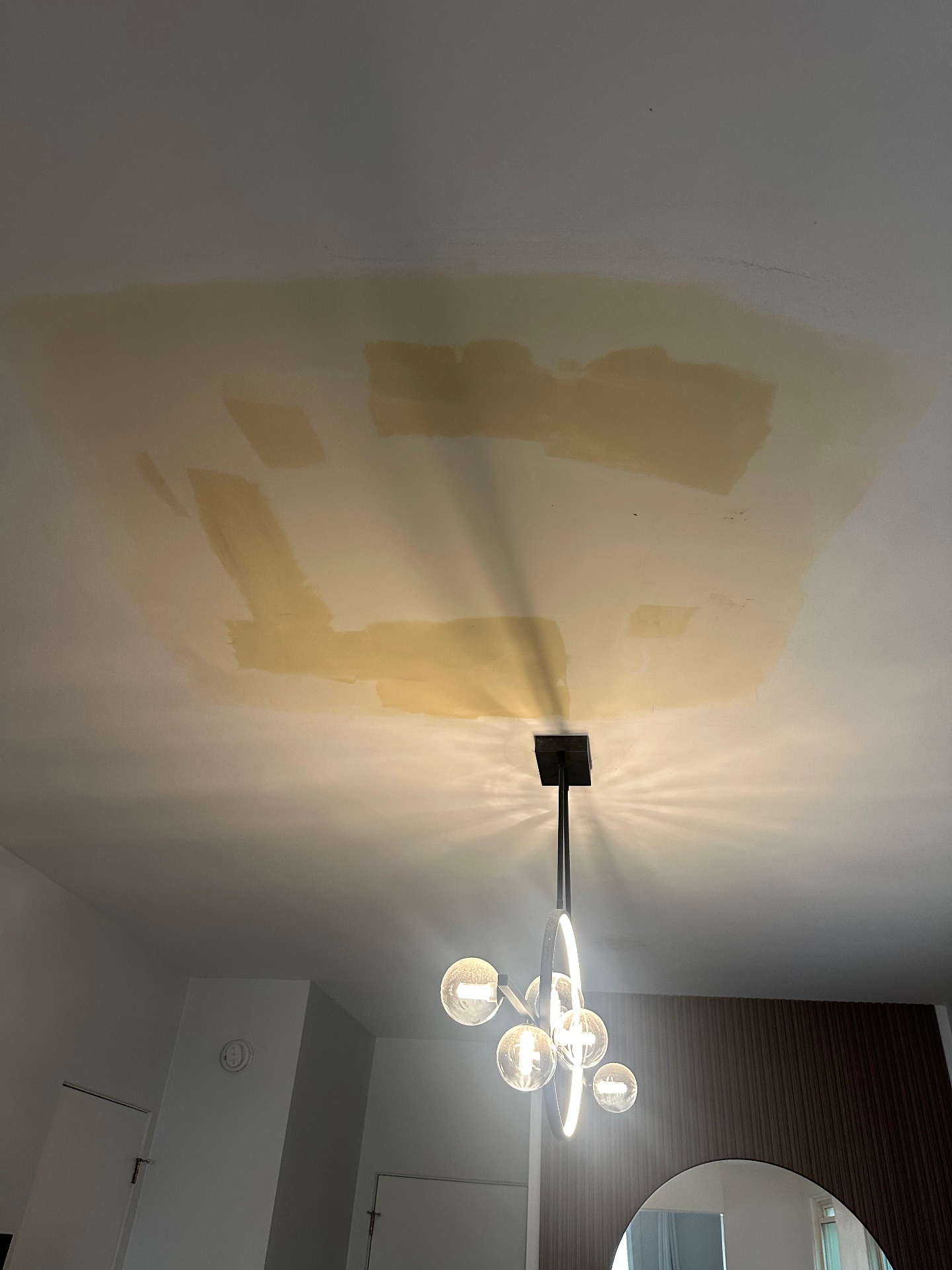 Water-damaged ceiling repair - Before - water stains and prior patches (Lake Forest, IL drywall project)