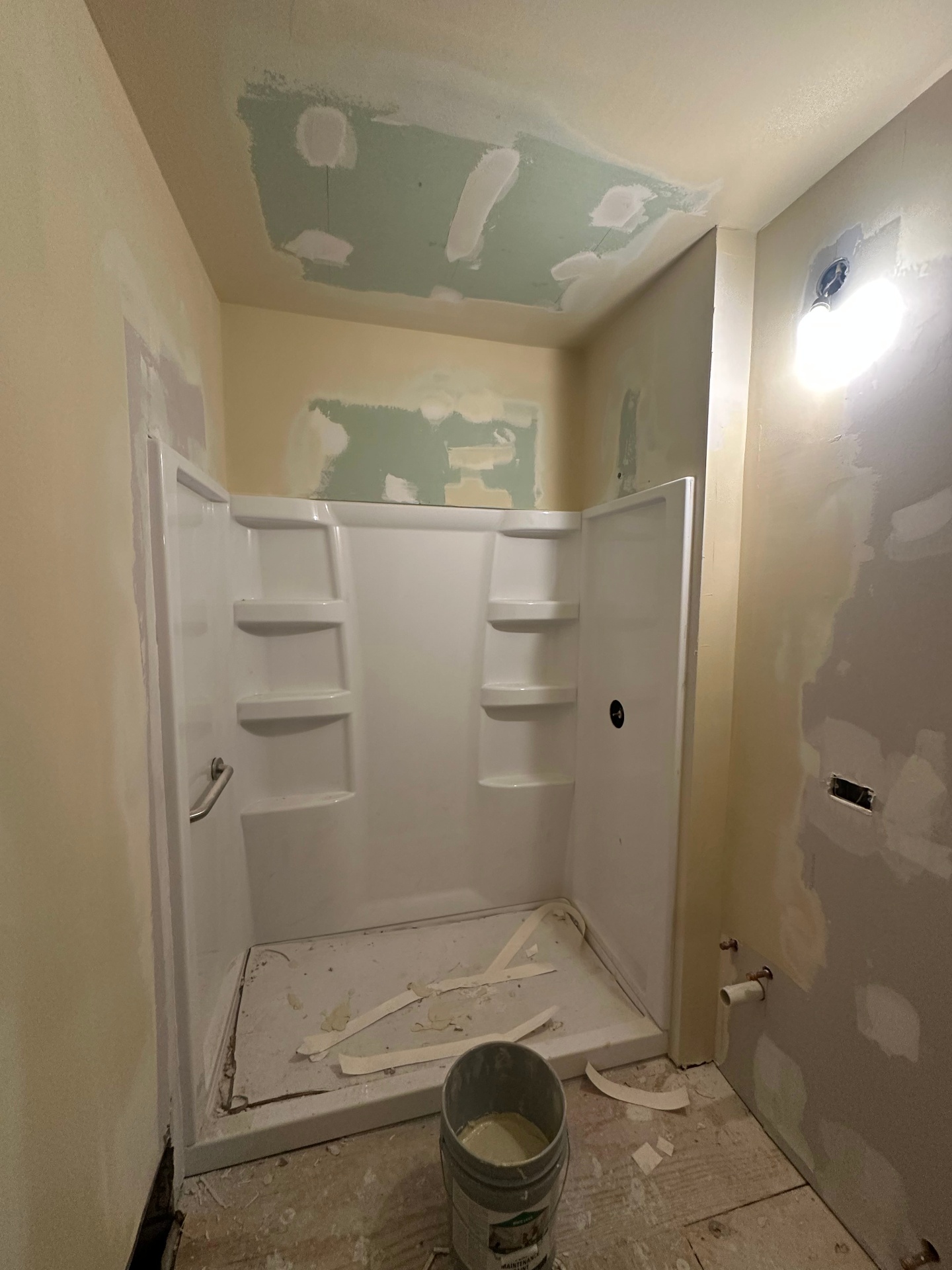 Bathroom shower surround patch - After - patched, taped, and blended (Deerfield, IL drywall project)