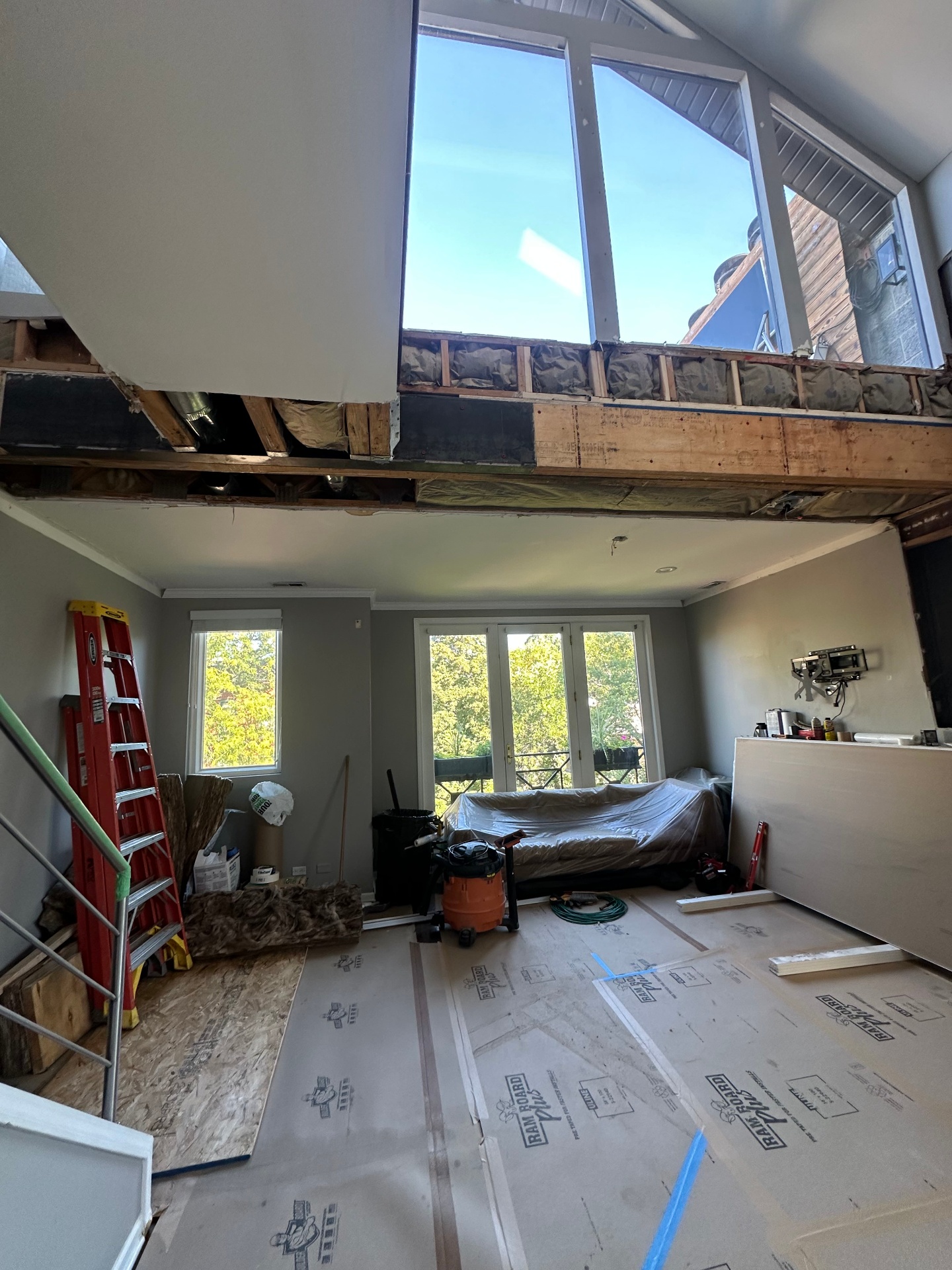 Vaulted great room ceiling rebuild - Demo - framing exposed for repair (Highland Park, IL drywall project)