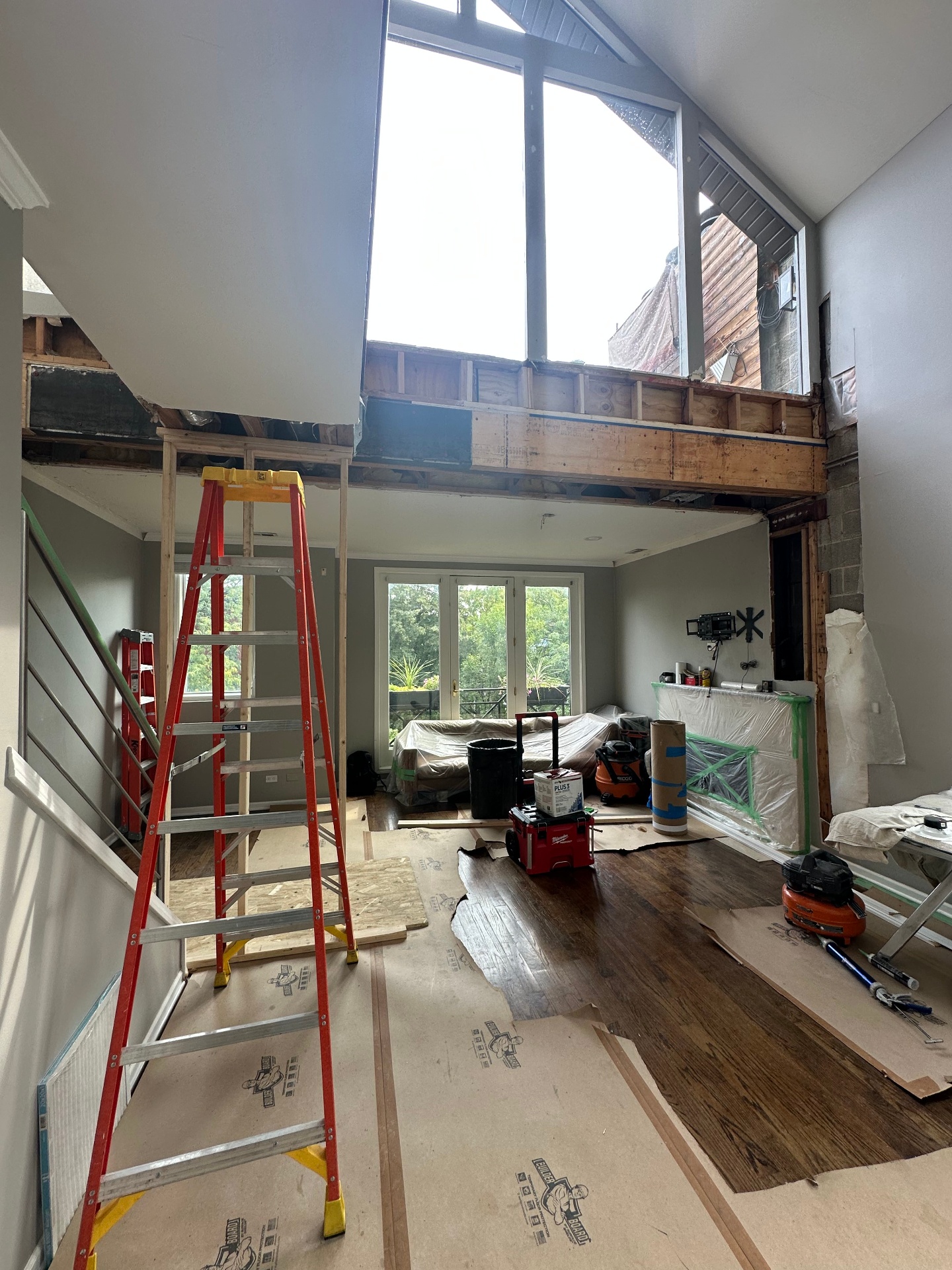 Vaulted great room ceiling rebuild - Before - original ceiling opened up (Highland Park, IL drywall project)